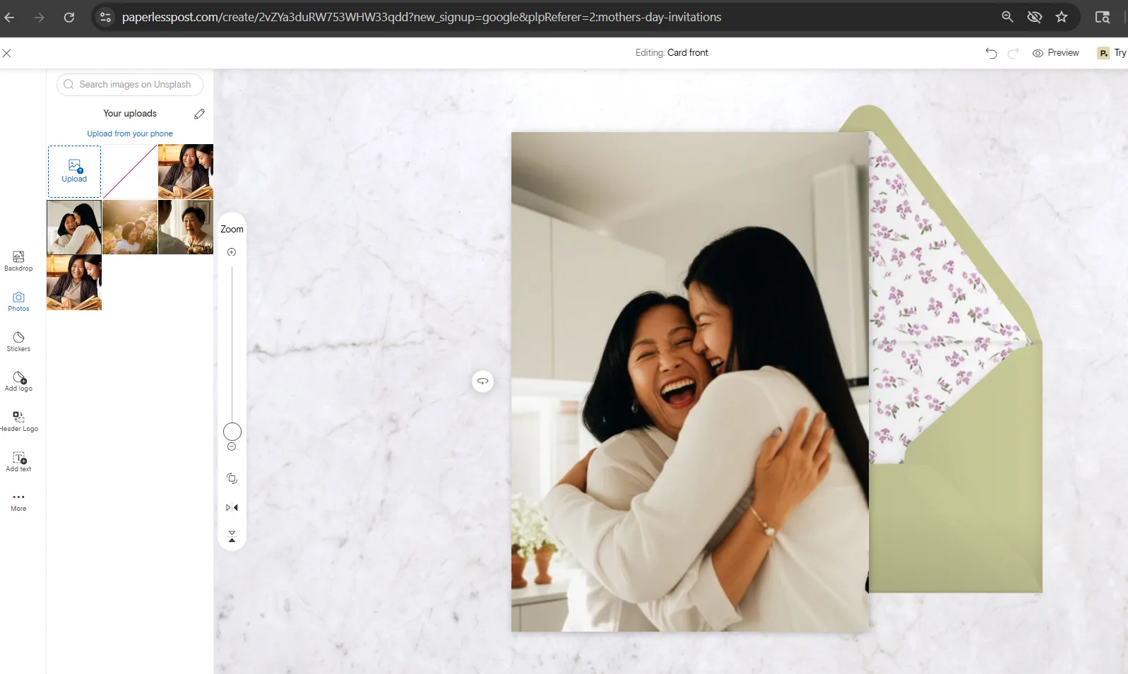 Paperless Post card editor with an uploaded photo on a card and envelope